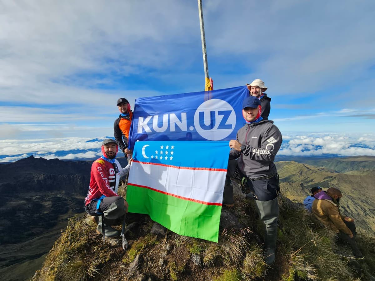 Uzbekistan's flag flies high on Oceania's tallest volcano