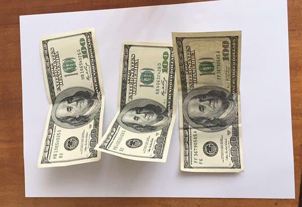 Qashqadaryoda hokim yordamchisi 300 dollar olayotganda ushlandi