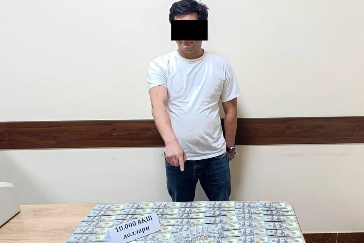 Qibray tumani hokimi yordamchisi 10 ming dollar bilan ushlandi
